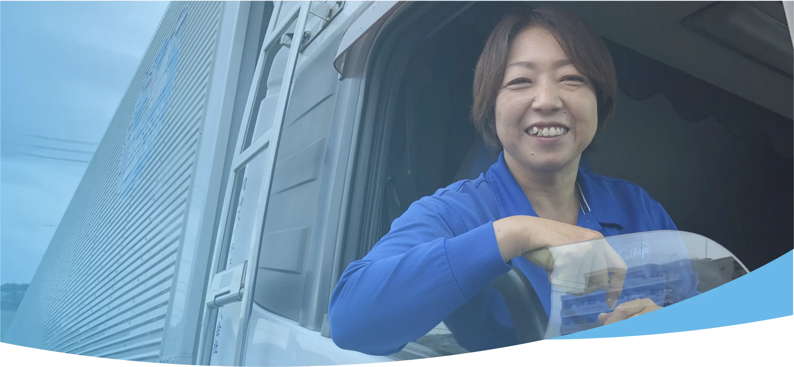 笑顔のドライバーの写真